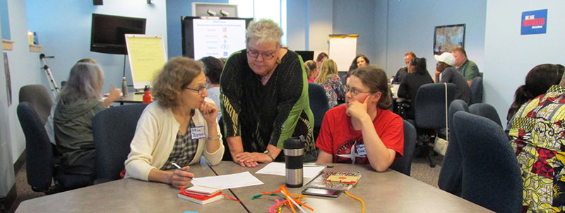 Linda Stout training working directly with participants
